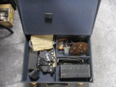 A 1930's cased Pathescope 200-B 9.5mm projector, housed within a material covered wooden case,