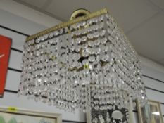 A vintage brass framed and lustre droplet ceiling light pendant