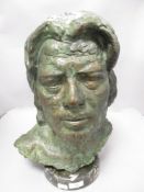 A substantial vintage cast metal bronze effect bust of a gentleman on stand.