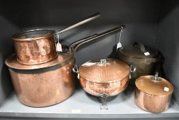 A selection of fine antique copper kitchen and cooking wares including footed tureen, large lidded