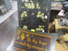 A Victorian hand-decorated papier mache letter rack, decorated with blossoms against the black