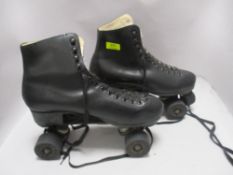 A pair of Vanflex vintage styled roller skates, with leather uppers, size unknown