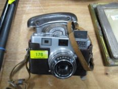 A Samoca 35 photography camera with case and lens
