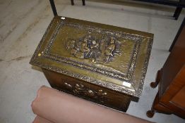 A brass slipper/kindling box