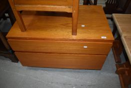 A vintage teak low chest of two drawers