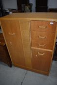 An early Gomme golden oak childs wardrobe