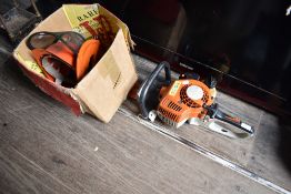 A Stihl hedge trimmer and accesories