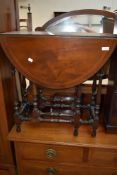 A nice quality reproduction mahogany gateleg table having turned frame and inlay decoration