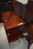 A late 19th or early 20th Century mahogany folding cake stand
