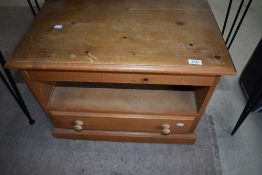A modern natural pine TV or similar unit with drawer base, width approx. 66cm