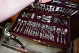 An impressive early 20th Century mahogany canteen on cabriole legs containing full set of Viners