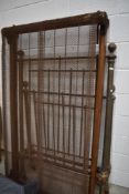 A Victorian brass single bed frame