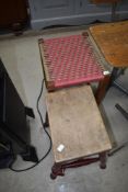 Two traditional stools including strung topped and four legged