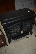 An electric fire, modelled as woodburning stove
