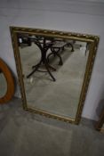 A modern gilt framed mirror