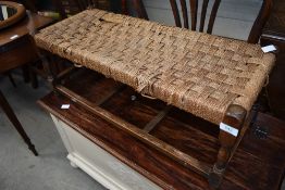 An early 20th Century strung top wide stool, af