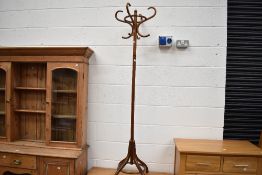 A modern steam bent Beech wood coat and hat stand