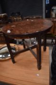 An early 20th Century burr wood coffee table of circular form