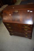 A reproduction mahogany bureau of small proportions, width approx. 74cm