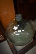 A large glass carboy