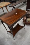 A 19th Century mahogany fold over card table having undershelf and cabriole legs