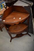 A Regency mahogany corner wash stand having under shelf with frieze drawer