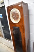 An early to mid 20th Century long cased clock of Art Deco design