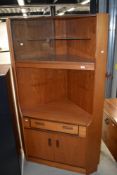 A vintage teak G plan corner display with drawer and double cupboard under