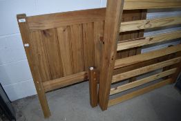 A rustic pine single bed frame