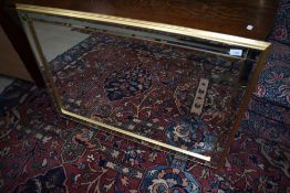 A modern gilt frame mirror