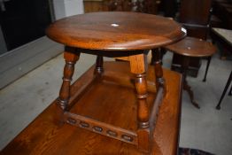 A Priory style coffee table, having circular top