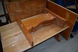 A traditional pine refectory style kitchen with pair of form style benches