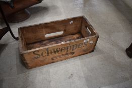 A vintage Schweppes crate
