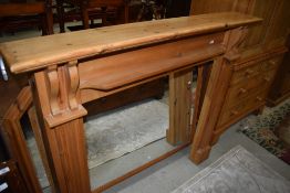 A natural pine fire surround