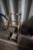 A late Victorian brass umbrella stand