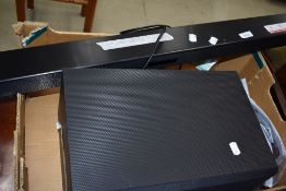 A LG soundbar and subwoofer