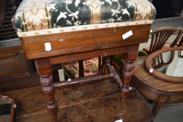 A 19th Century mahogany adjustable piano stool