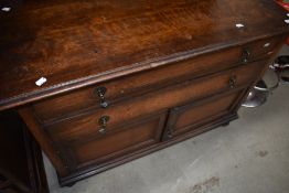 An early 20th Century oak side cabinet