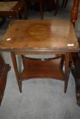 An Edwardian mahogany fold over occasional table