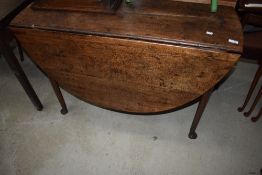 A 19th Century oak gateleg dining table