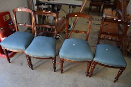 Two pairs of 19th Century mahogany dining chairs, all with same later upholstery