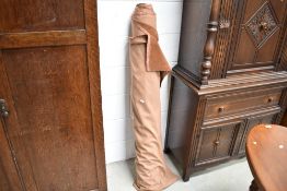 A roll of upholsterers or haberdashery plush fabric
