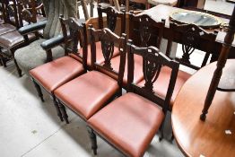 A set of six Victorian dining chairs with carved vase backs