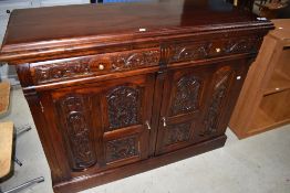 A reproduction Victorian style mahogany sideboard