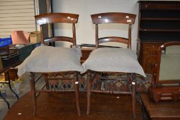 A pair of Victorian mahogany bedroom chairs having ply seats