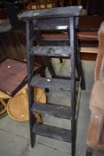A traditional set of wooden step ladders