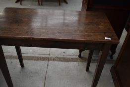 A 19th Century mahogany side table (previously a fold over or end of a dining table