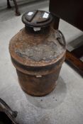 A vintage oil can of large proportions
