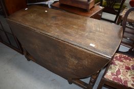 A traditional oak gateleg table in the Period style