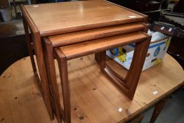 A vintage teak G plan nest of three tables